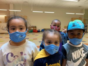 Children with masks in Early Learning Center